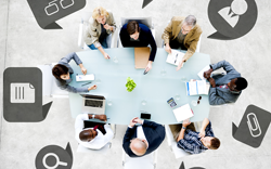 Stock image meeting at a table from above