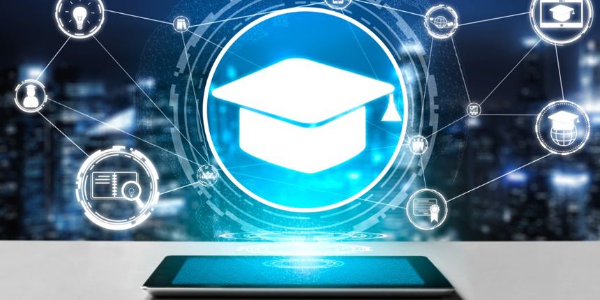 image of a grad hat over a computer