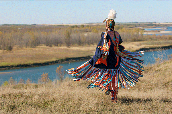 indigenous woman looking into the horizon
