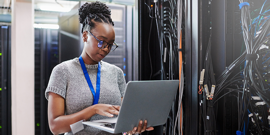 Black History Month, image of woman holding a laptop 4x2