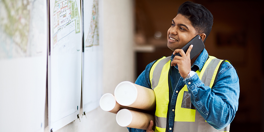 Engineer looking at whiteboard 4x2