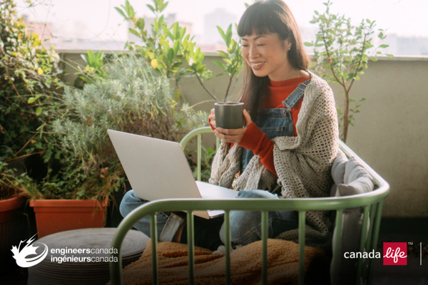 A woman sits on a balcony surrounded by plants, smiling at her laptop and holding a mug. She wears overalls and a cozy sweater. Logos for Engineers Canada and Canada Life are visible in the bottom corners.