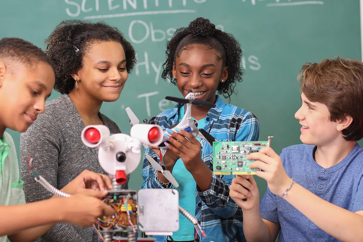 Kids assembling an engineering project