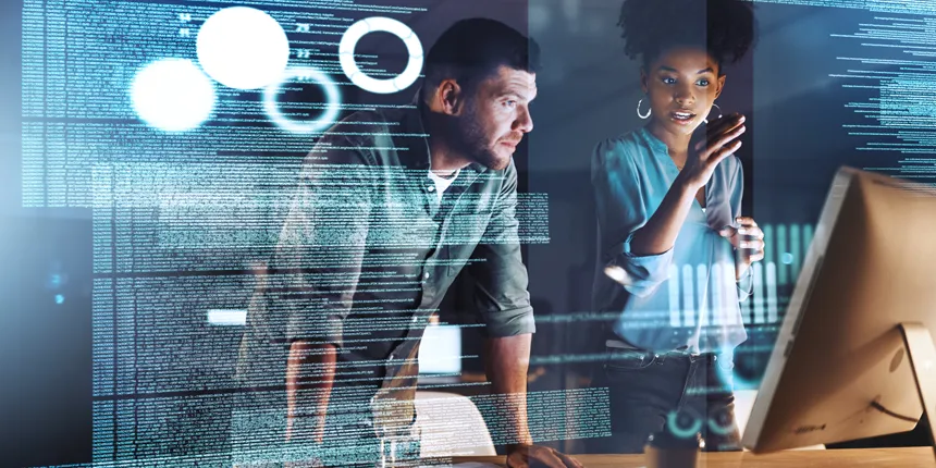 Stock photo of two programmers working on computer code