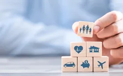 Stock image hand building blocks