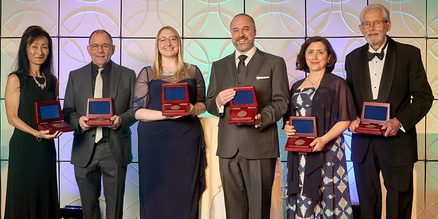 Recipients of the 2024 Engineers Canada Awards holding their medals